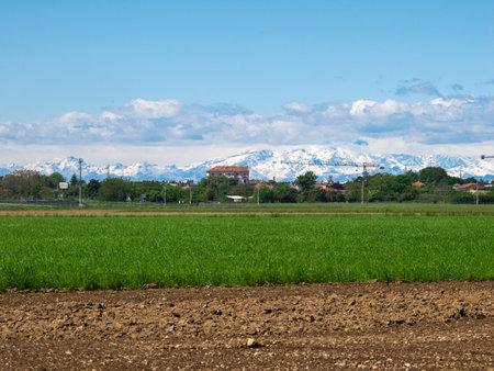 House against mountain in background at Cinisello Balsamo, Milan, Lombardy, Italyの写真素材