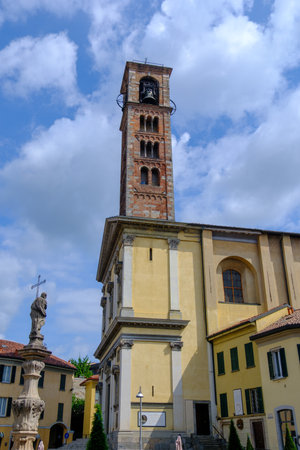 Old buildings of Carate Brianza, Lombardy, Italy, with the SS Ambrogio e Simpliciano churchの写真素材