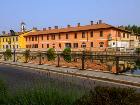 Gaggiano, historic town along the Naviglio Grande, Milan, Lombardy, Italy, with colofrul houses along the canalの写真素材
