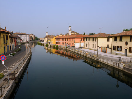 Gaggiano, historic town along the Naviglio Grande, Milan, Lombardy, Italy, with colofrul houses along the canalの写真素材