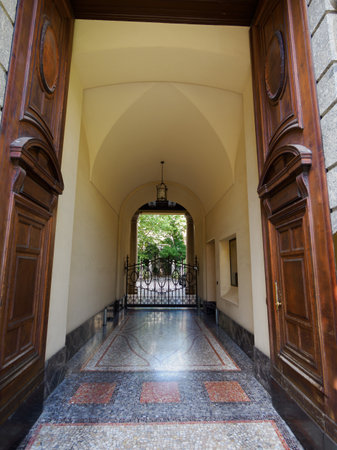 Entryway of historic palace along Via Passione in Milan, Lombardy, Italyの写真素材