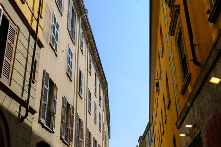 Residential buildings along Via Braccio da Montone in Milan, Lombardy, Italyの写真素材