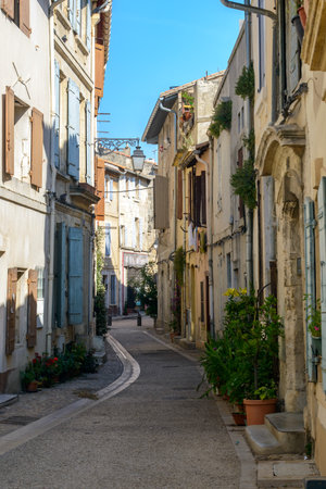 Arles (Bouches-du-Rhone, Provence-Alpes-Cote-d'Azur): a typical old streetの写真素材