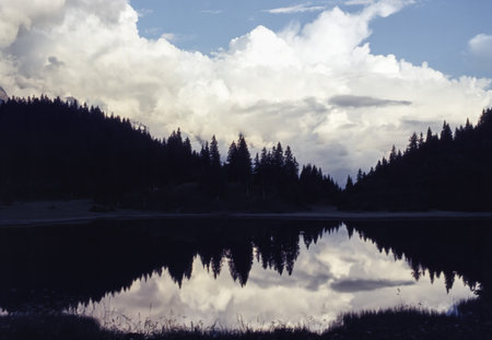 Lago Dosso, mountain lake near San Bernardino, Canton Grigionim Switzerland, at eveningの写真素材