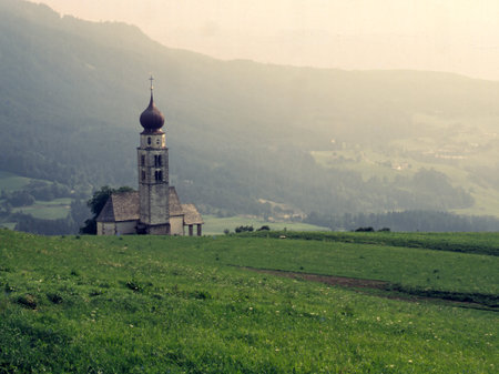 The famous little church of the Alpe di Siusi, Bolzano province, Trentino-Alto Adige, Italy, in the summertimeの写真素材