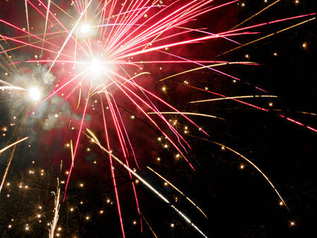 Fireworks for the New Year along via Piero della Francesca in Milan, Lombardy, Italy