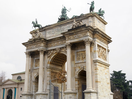 Milan, Lombardy, Italy: Arco della Pace, historic arch with the Olympic cauldron for the Olympic Games Milano-Cortina 2026の写真素材