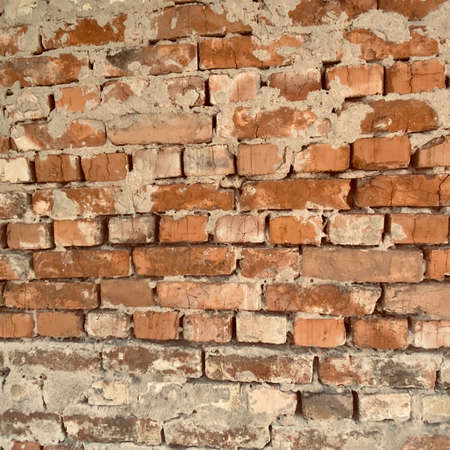 The old brick wall is photographed close-upの写真素材