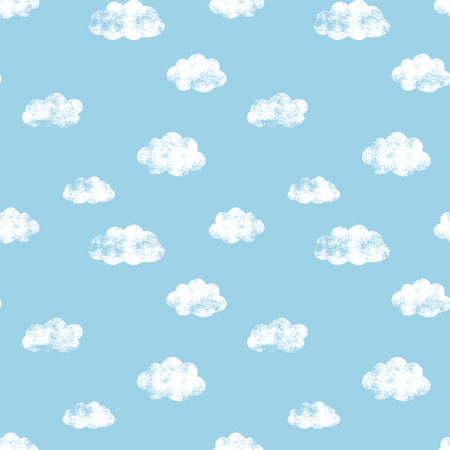 Seamless pattern with hand drawn clouds on a blue background.の写真素材