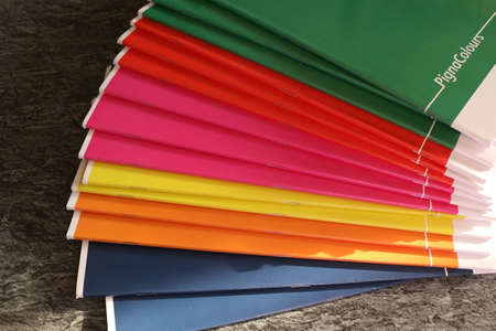 Colorful school notebooks monochromeのeditorial素材