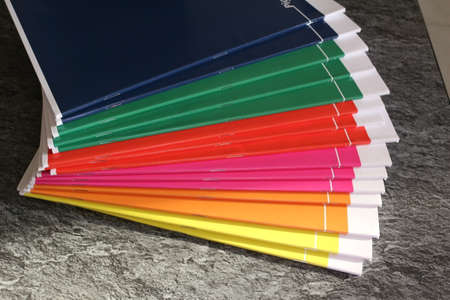 Colorful school notebooks monochromeのeditorial素材