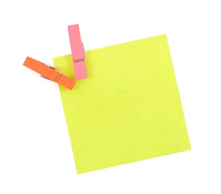 paper notes and clothespins isolated on white backgroundの写真素材