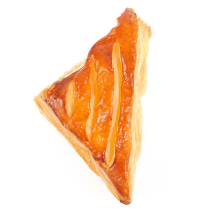 A puff pastry pie with cheese isolated on white backgroundの写真素材