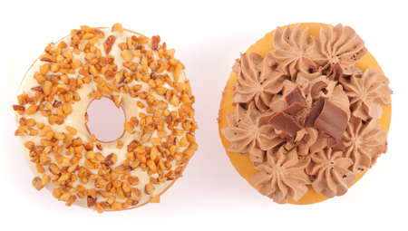 Donut and bread with chocolate whipped swirled isolated on white backgroundの写真素材