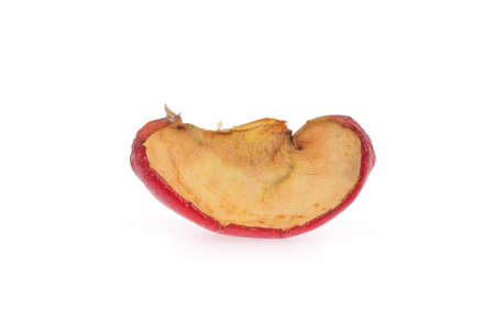 Wrinkled slice apple isolated on white の写真素材