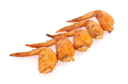 Roast chicken wings isolated on white background.の写真素材