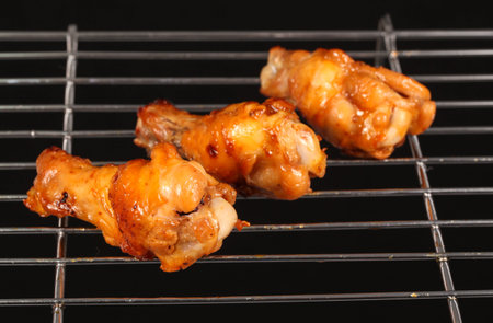 Grilled chicken Legs on the grillの写真素材