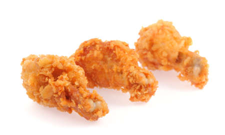 fried chicken drumsticks isolated on white backgroundの写真素材