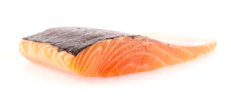 raw salmon fillet isolated on white backgroundの写真素材
