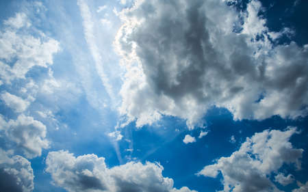 Blue sky background with tiny cloudsの写真素材