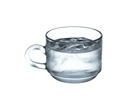 cup glass of pure water with ice cubes. Isolated on white backgroundの写真素材