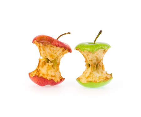 bitten wilted apple isolated on white backgroundの写真素材