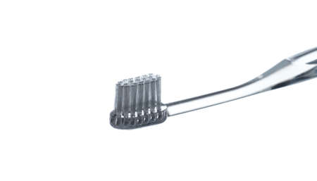 plastic toothbrush isolated on white backgroundの写真素材