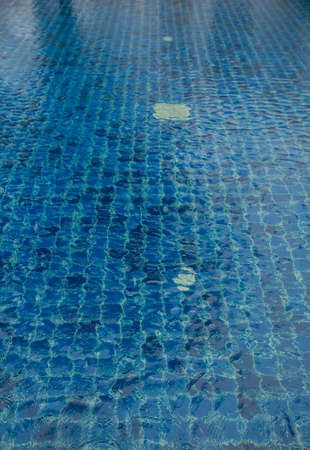 Blue swimming pool rippled water detail