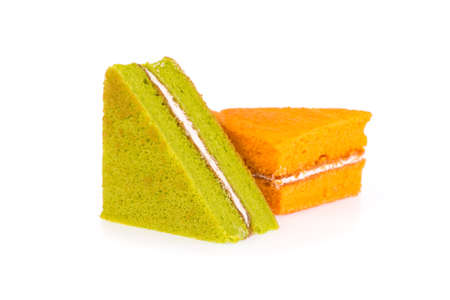 pandan and orange cake isolated on white backgroundの写真素材