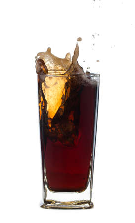 Fresh Coca Cola  with splash isolated on a white background