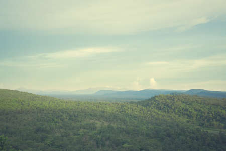 mountains green grass and blue sky landscapeの写真素材