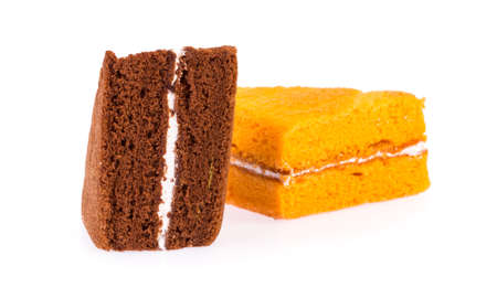 Dark chocolate and orange cake isolated on white backgroundの写真素材