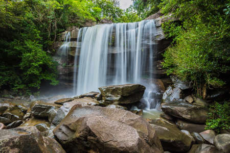 river background with small waterfalls in tropical forest.