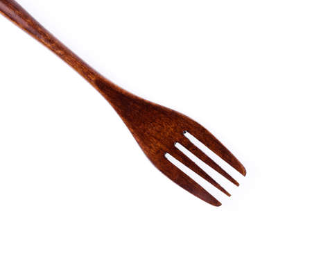 wood fork isolated on white background.の写真素材