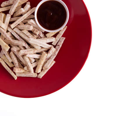 Taro French fries with sauce isolated on white background.の写真素材