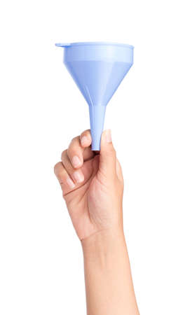 hand holding plastic Kitchen funnel isolated on white backgroundの写真素材