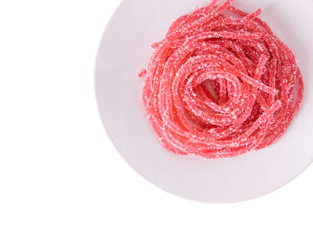 Jelly sweet, dessert colorful with sugar on plate isolated on white background.