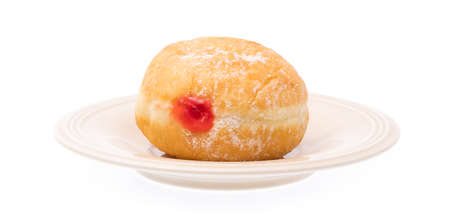 jelly filled doughnuts on dish isolated on white backgroundの写真素材