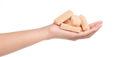 hand holding strawberry waffles isolated on white backgroundの写真素材