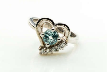 green emerald band ring on white backgroundの写真素材