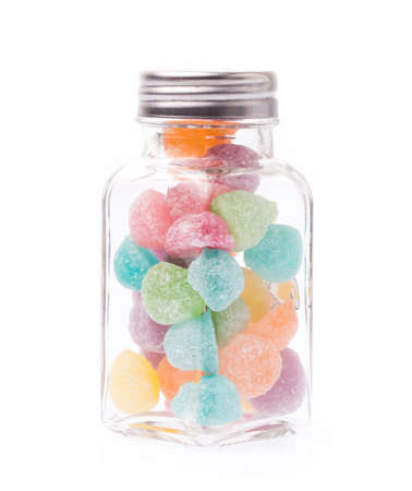 bottle of colorful jellys isolated on white backgroundの写真素材