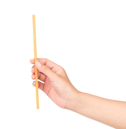 hand holding drinking straw isolated on white background.の写真素材