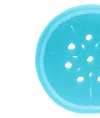 Blue sponge isolated on white background.の写真素材