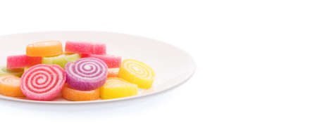Jelly sweet on a dish isolated on white backgroundの写真素材