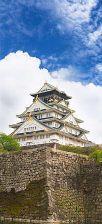 Osaka Castle with dramatic cloudy skies in Osaka, Japan.のeditorial素材