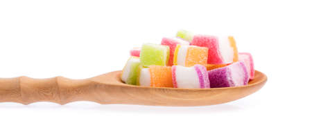 colorful jellys on ladle isolated on white backgroundの写真素材