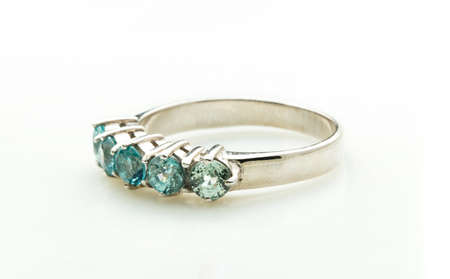 green emerald band ring on white backgroundの写真素材