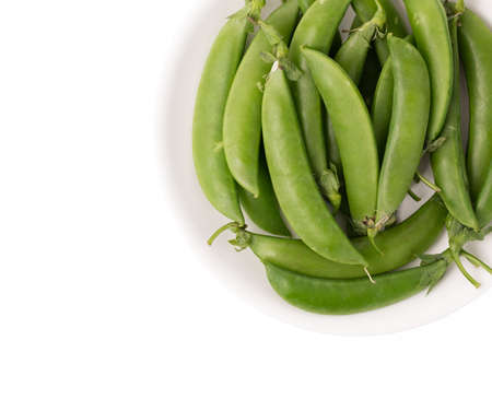string bean on plate isolated on white backgroundの写真素材