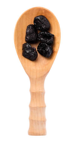 wood ladle of Dried prune isolated on white backgroundの写真素材