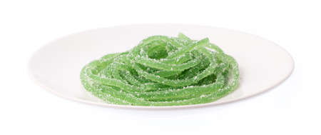 Jelly sweet, dessert colorful with sugar on plate isolated on white background.の写真素材